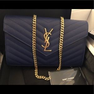 Saint Laurent monogram leather wallet on a chain